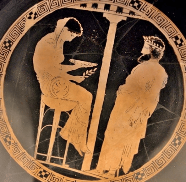 The Pythia on her tripod giving an oracle on a kylix in the Altes Museum in Berlin.