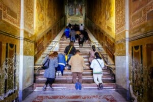 People pray at Holy Stairs, Scala Santa, in Rome, Italy