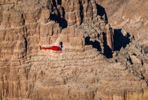 Helicopter flying over Grand Canyon West Rim in Arizona, USA