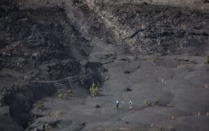 Hikers at Kilauea Iki Trail in Hawaii Volcanoes National Park