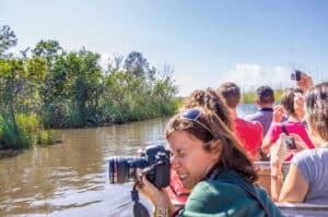 Tourists on airboat, Everglades - Miami