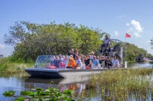 Tourists on airboat, Everglades - Miami