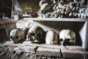 Skulls stacked in Fontanelle ossuary, Naples